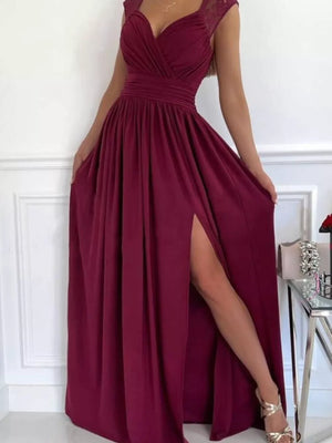 Burgundy maxi dress with lace accents, V-neck, ruched waist, and high slit