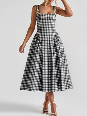 Black plaid square neck midi dress with a-line skirt and gathered waist detail.