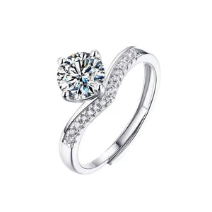 Dazzling moissanite sterling silver ring with brilliant accent stones.