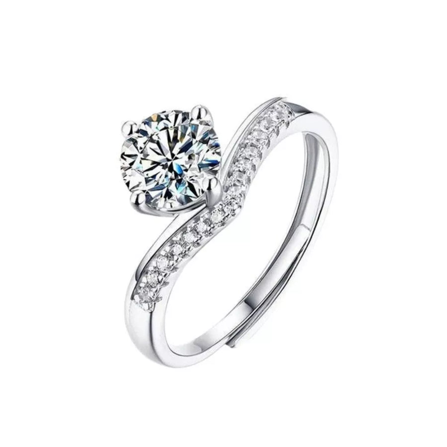 Dazzling moissanite sterling silver ring with brilliant accent stones.