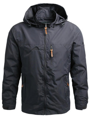 Men's dark blue hooded windbreaker jacket with zip pockets and embroidered logo.