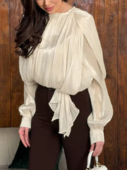 blouse in ivory featuring tied and relaxed fit