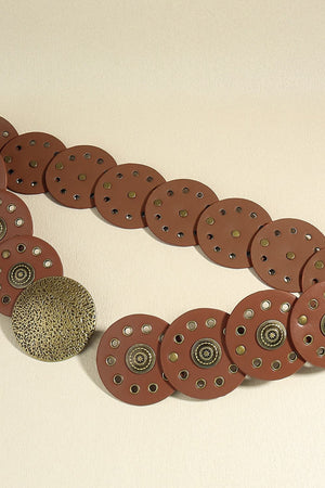 Brown faux leather belt with round disc embellishments and metal studs