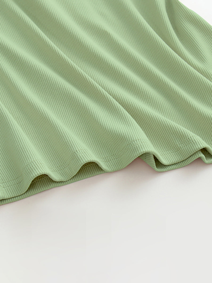 Ribbed halter tank top in Gum Leaf green with built-in bra detail.