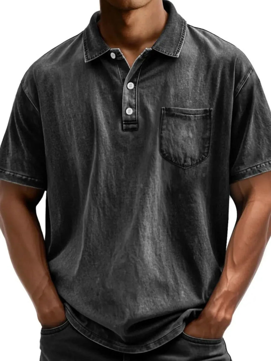 Black acid wash relaxed fit polo shirt with chest pocket and button placket.