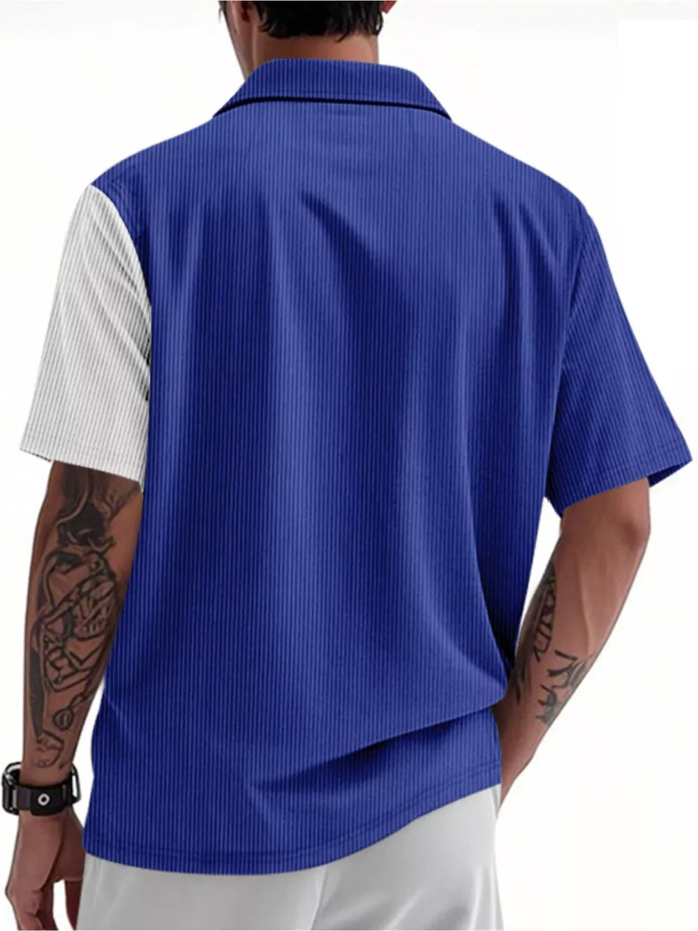 Men's blue and white corduroy short sleeve buttoned shirt with a color block design.