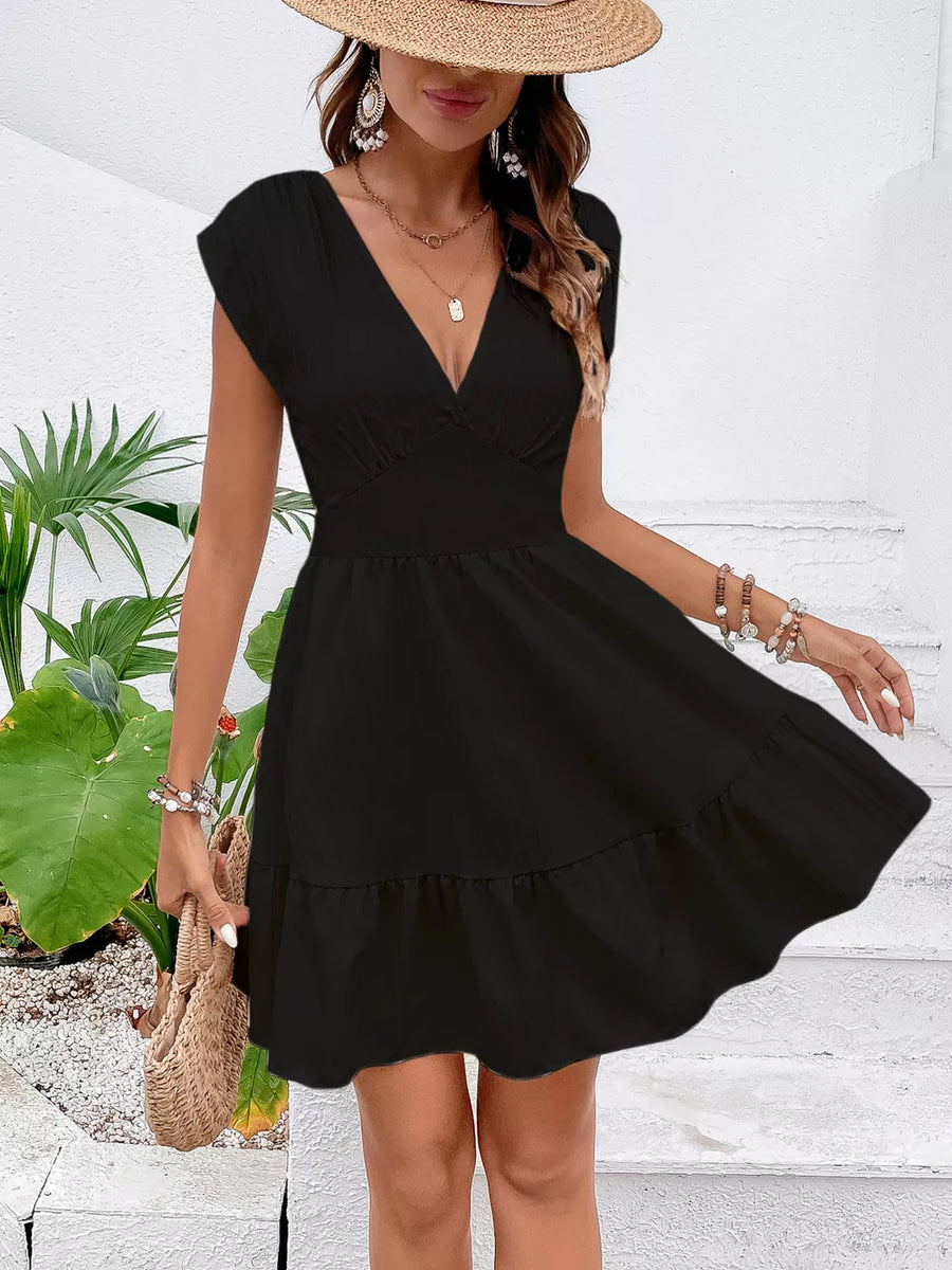 Black cap sleeve mini dress with tiered ruffle hem and deep V-neckline.