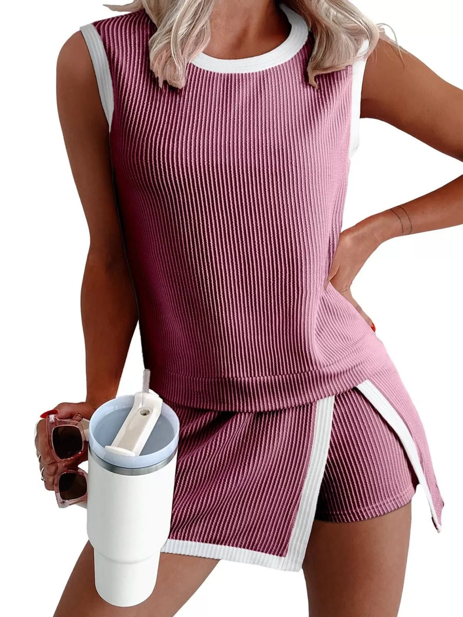 Ribbed knit sleeveless top and skort set in Purple Red with white trim.