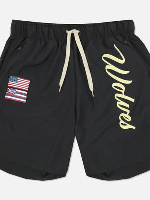 Black active shorts with drawstring, flag patch, and script logo detail.
