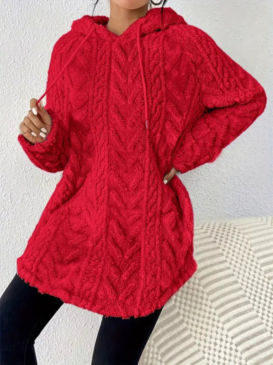 Red textured fleece hoodie with cable knit pattern and drawstring hood.