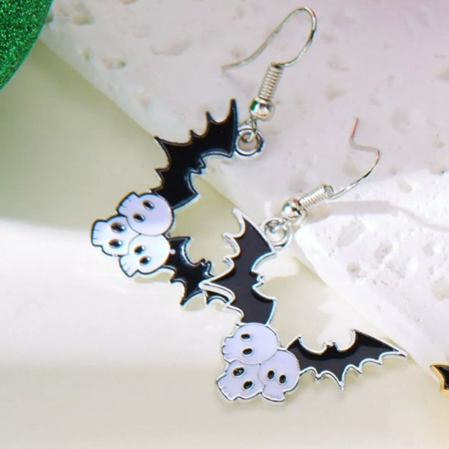 white ACCESSORIES featuring drop design and bat and skull motif