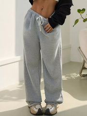 Gray wide-leg maternity joggers with drawstring waist and pockets.