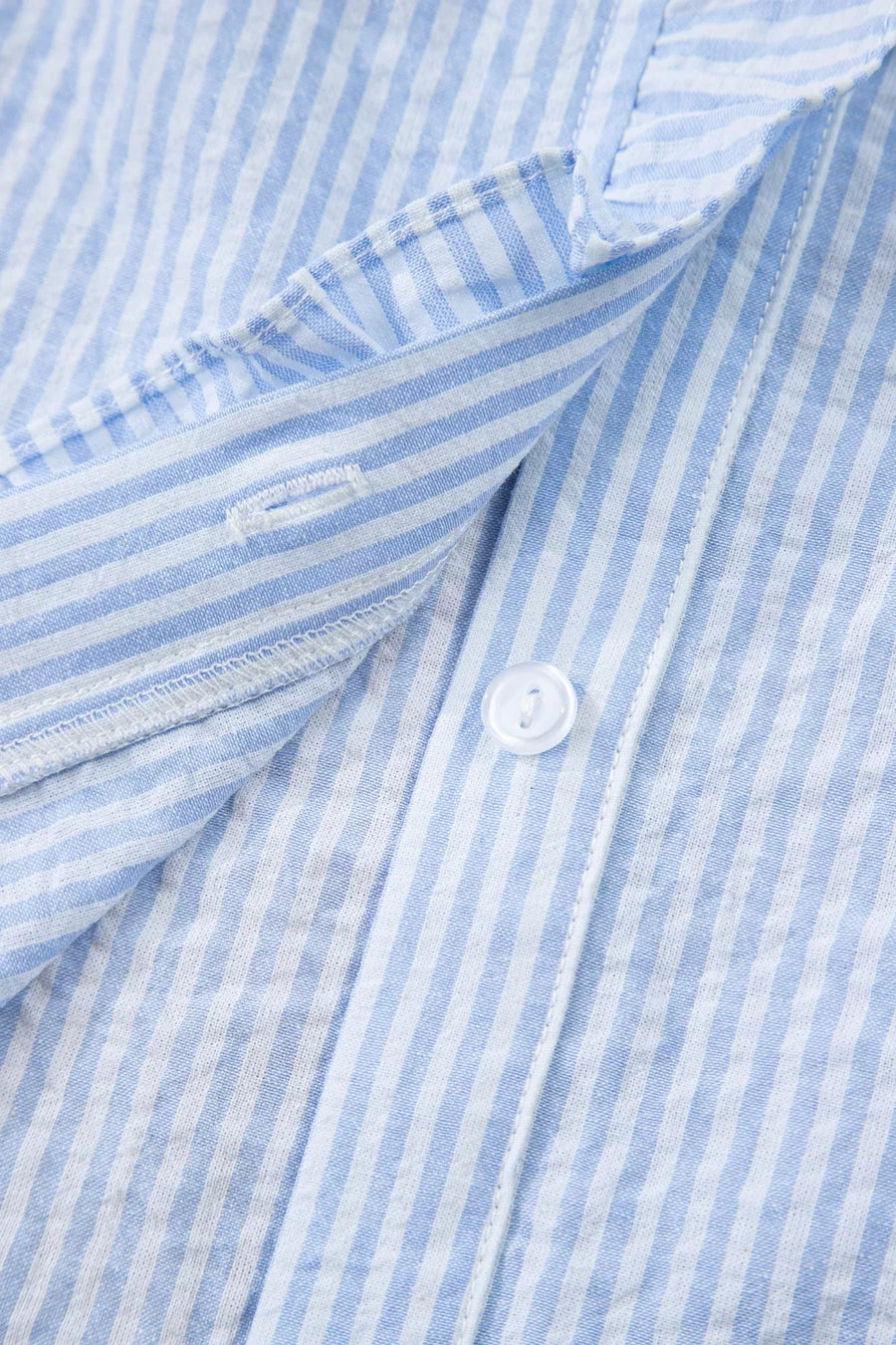 Blue and white striped cotton shirt with frill detail and button closure