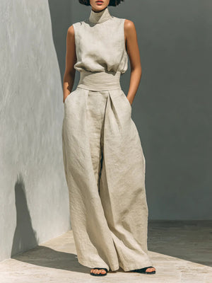 Sleeveless mock-neck ivory linen top and wide-leg pants set with belted waist