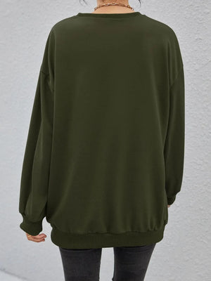 Oversized sweatshirt in Black Forest with crewneck and ribbed cuffs and hem.