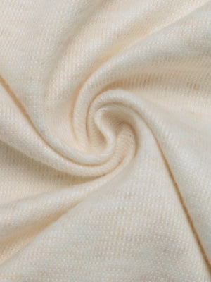 Cream knit fabric with a soft texture