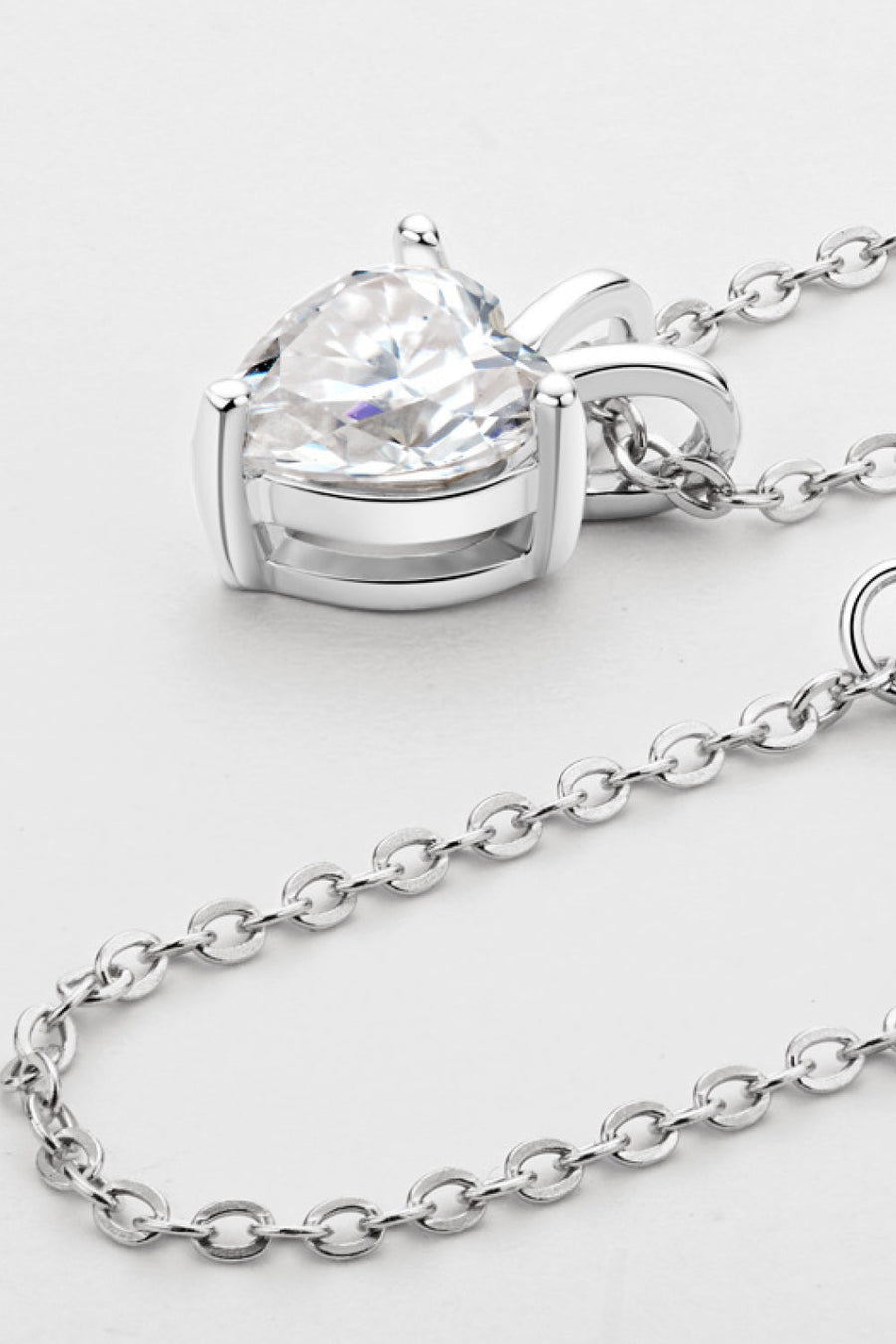 Silver heart-cut moissanite solitaire necklace with oval link chain