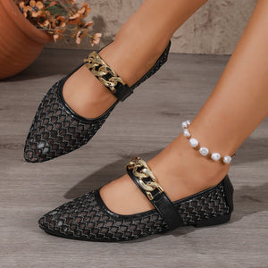 flats in black featuring point toe and flat fit