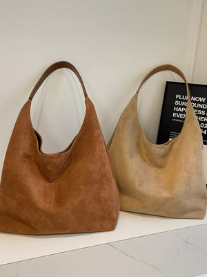 Elegant suede hobo tote mini handbag in brown and khaki with leather straps.
