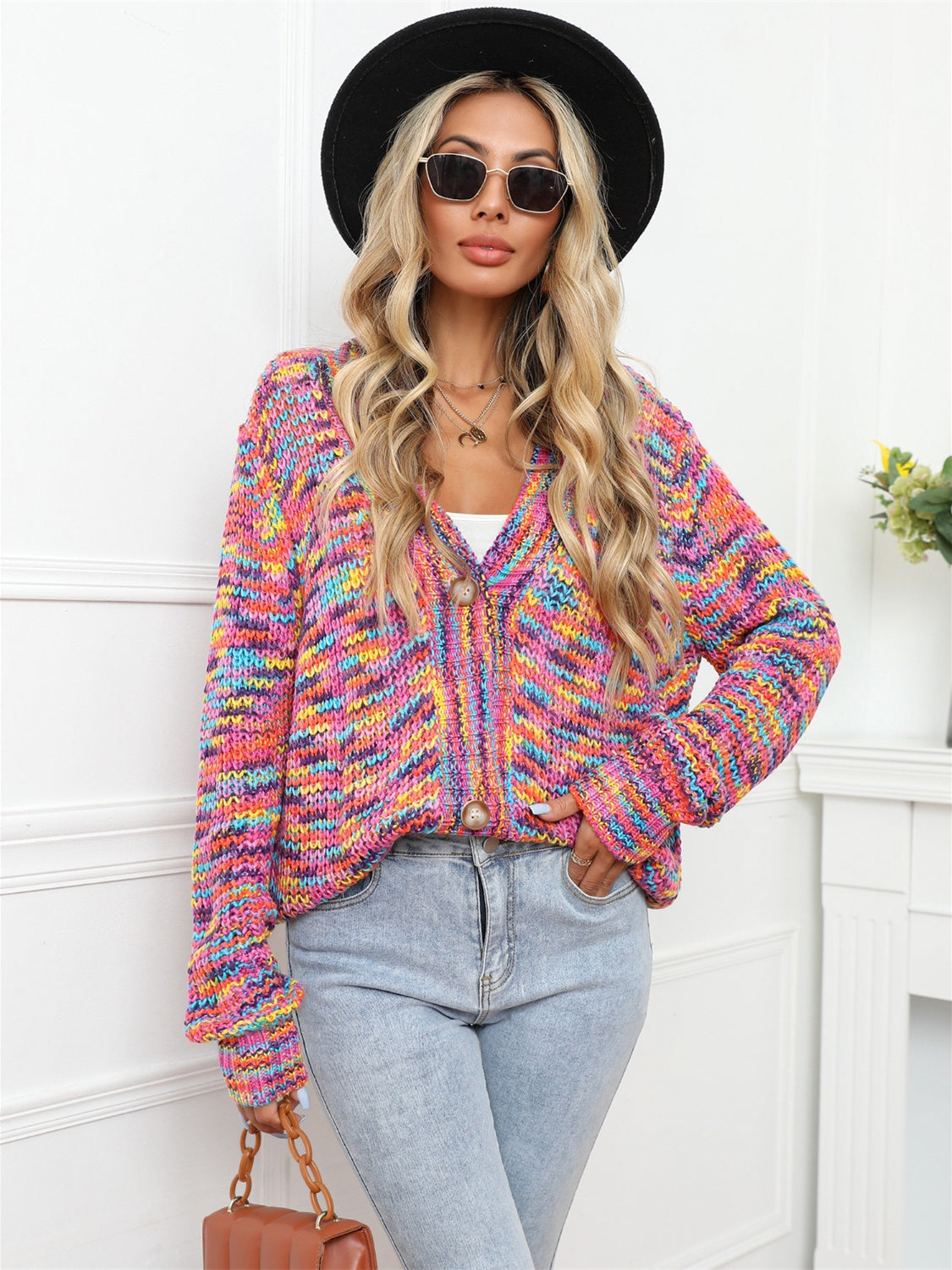 Multicolor knit buttoned cardigan with a chevron pattern and relaxed fit.