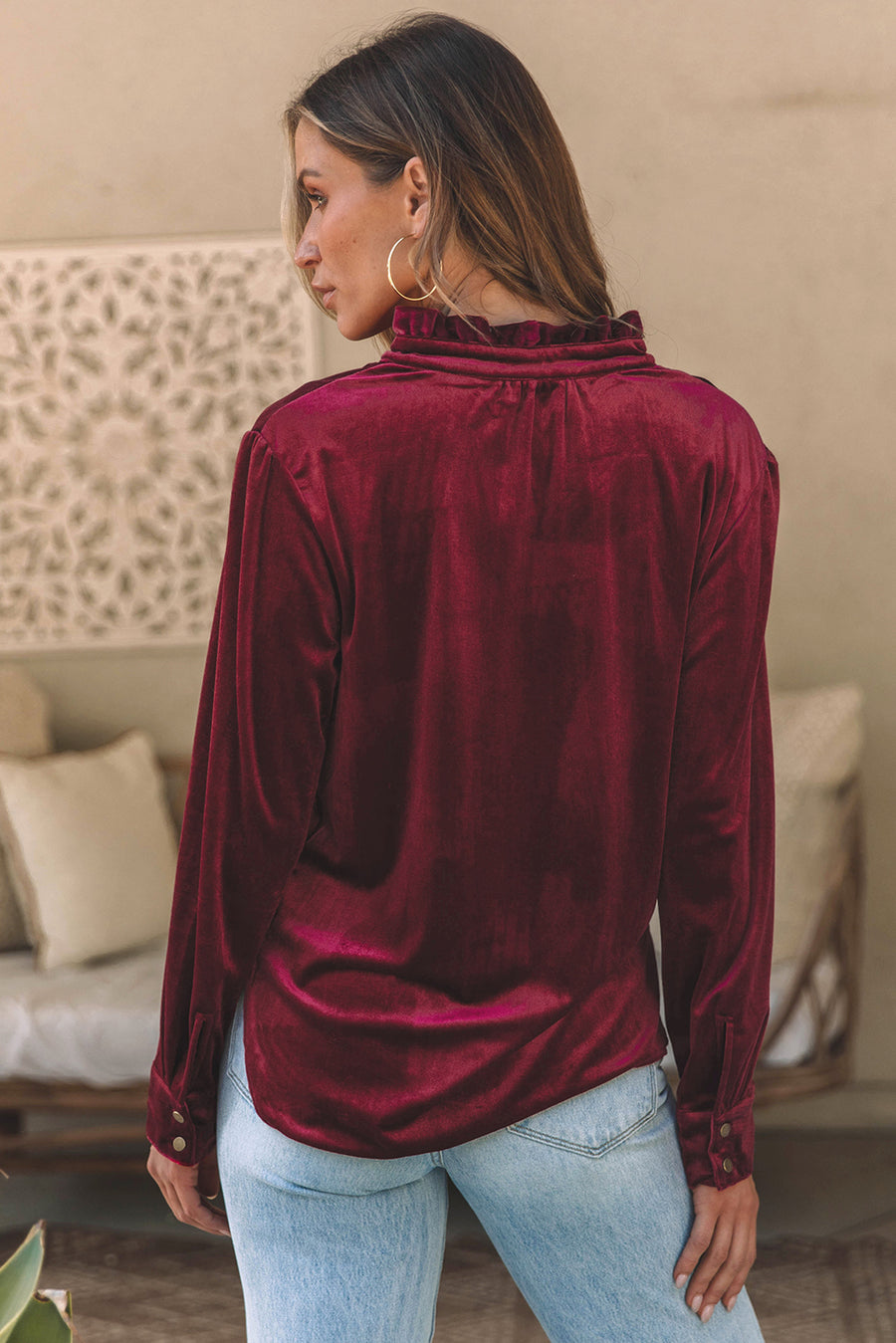 Burgundy velvet button-down blouse with mandarin collar and ruffled neckline detail.
