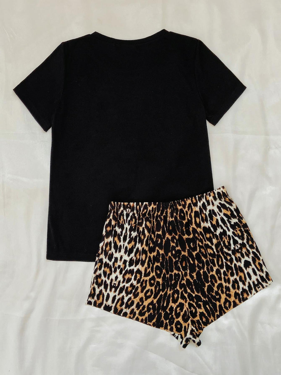 Black t-shirt and leopard print shorts pajama set with elastic waistband.