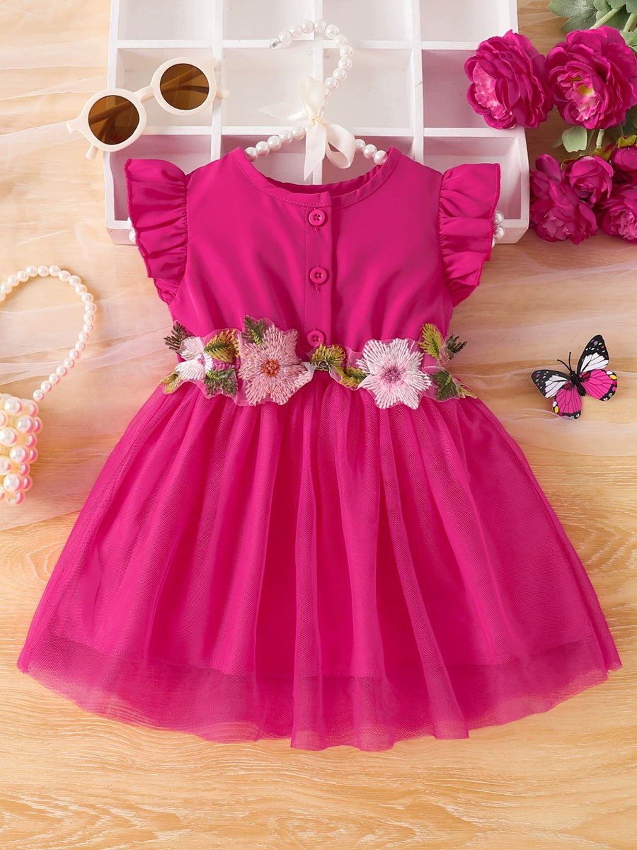Deep Rose baby dress with floral appliqué belt, ruffle sleeves, and button front.