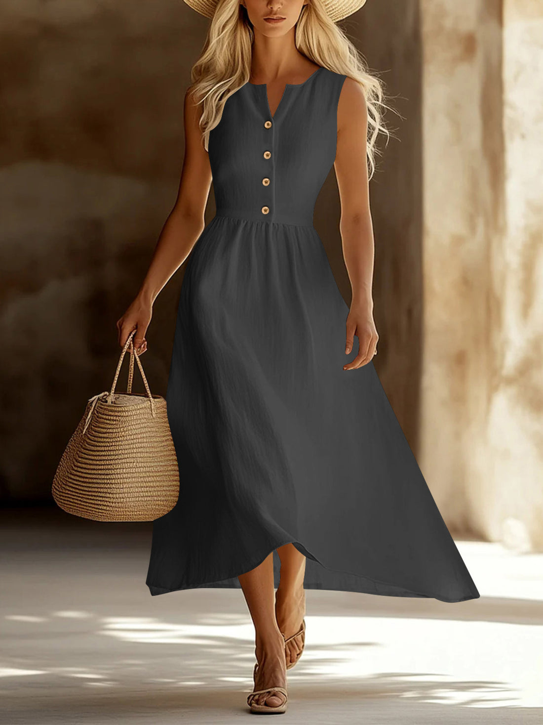 Gray sleeveless button front midi dress with a-line skirt and contrasting buttons.