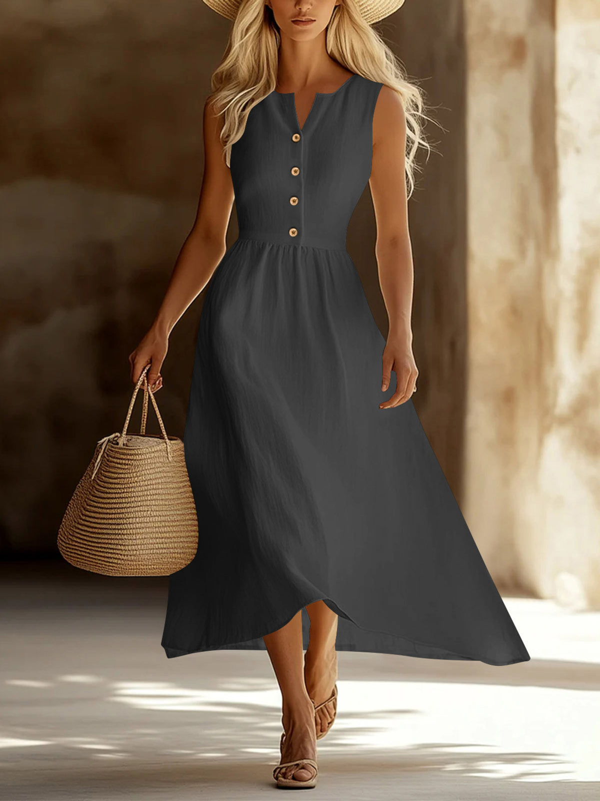 Gray sleeveless button front midi dress with a-line skirt and contrasting buttons.
