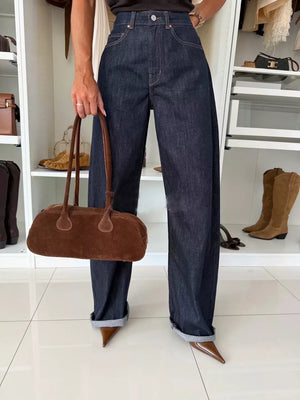 Dark navy high-waisted wide-leg jeans with a cotton blend denim fabric and cuffed hems.