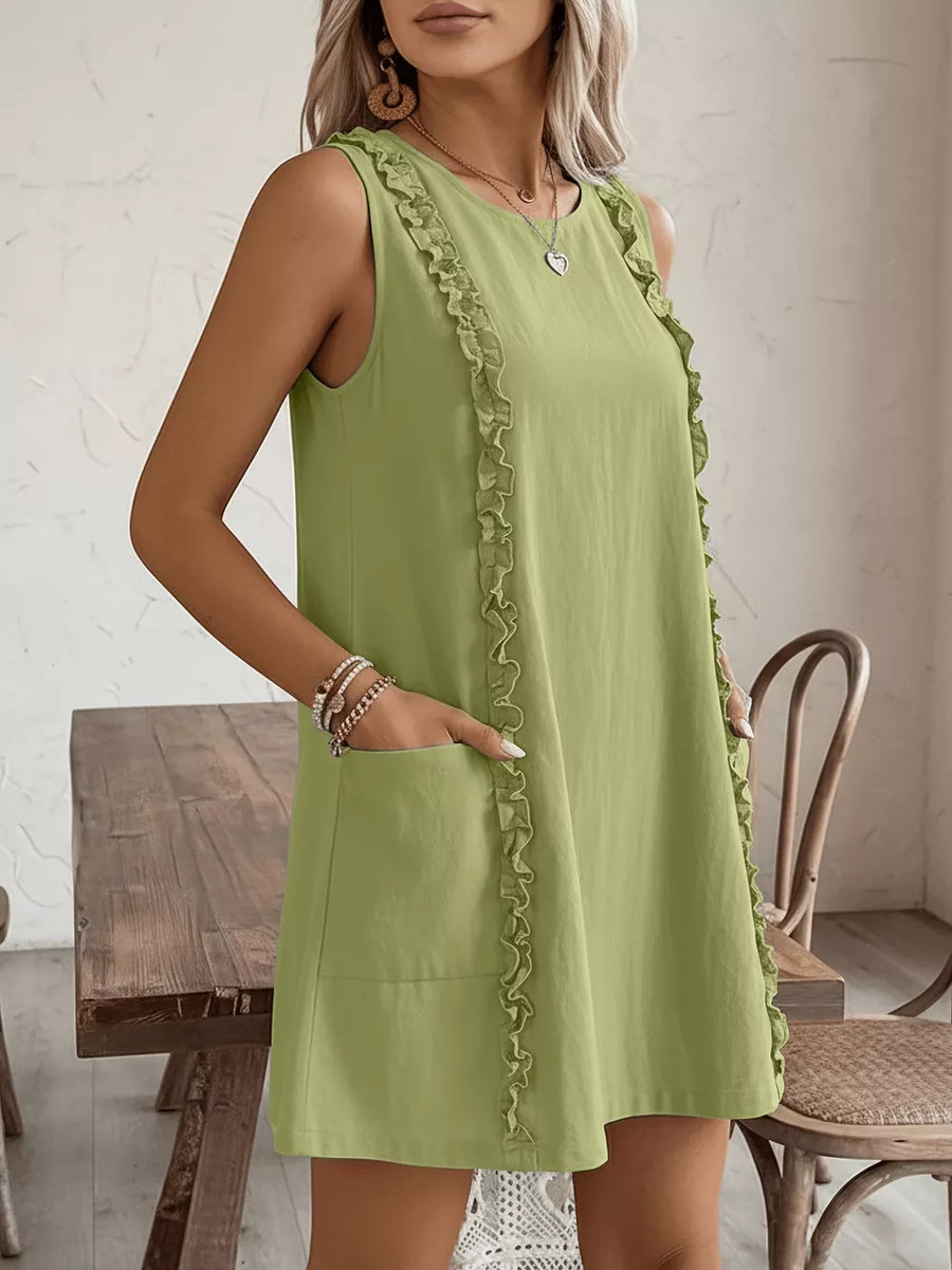 Yellow-Green sleeveless dress with frill detail and pockets.