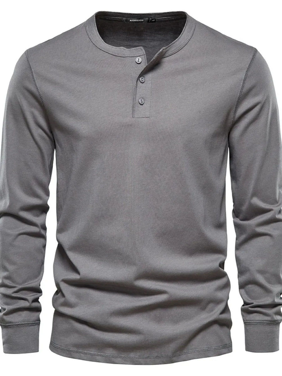 Gray long sleeve Henley knit t-shirt with button placket and crew neck.