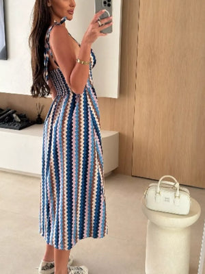 Floral tie-strap midi dress with smocked bodice in a colorful stripe pattern.
