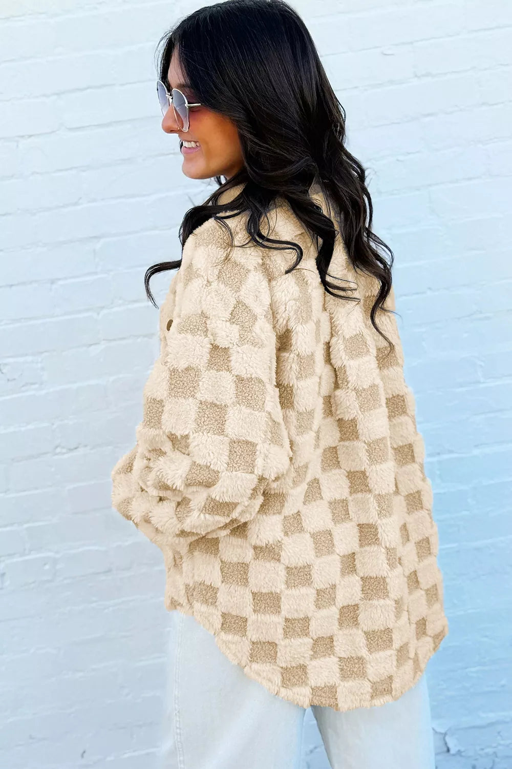 tan shacket featuring buttoned and checked