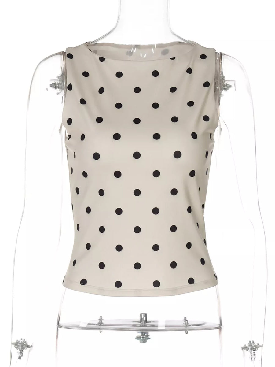 Chic polka dot tank top in khaki with a boat neck and cropped fit.
