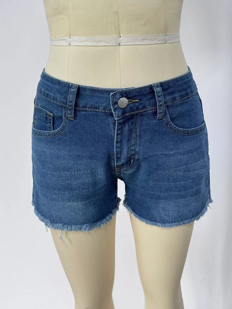 Classic blue denim shorts with frayed hem and button fly.