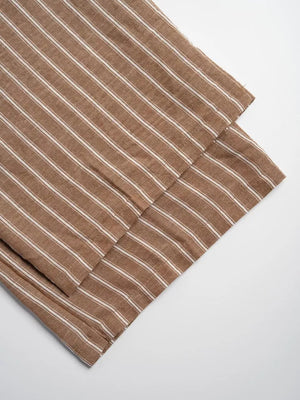 Chic striped two-piece set in camel with tie front detail.