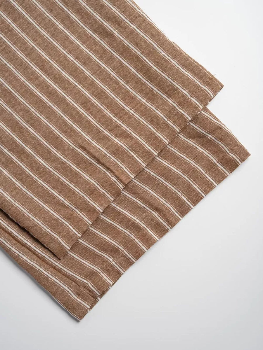 Chic striped two-piece set in camel with tie front detail.