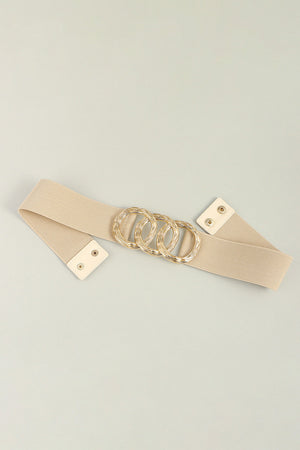 Tan elastic belt with triple gold interlocking ring buckle and snap closure.