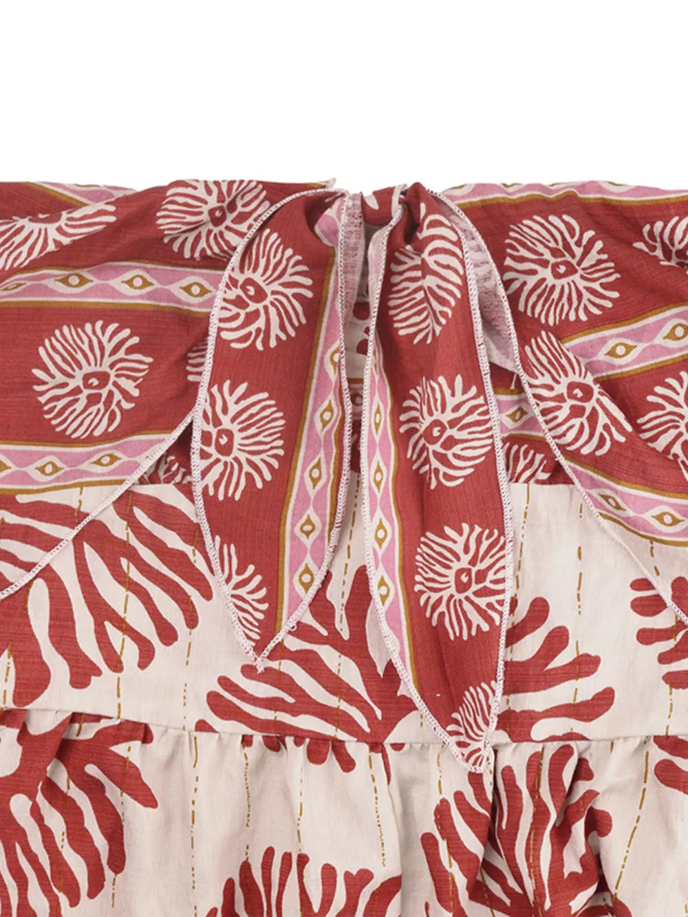 Charming Floral Tie-front Wide-leg Romper in red with white floral and coral print, tie neckline detail.