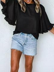 Black ruffled mock neck half sleeve shirt with flared sleeves.