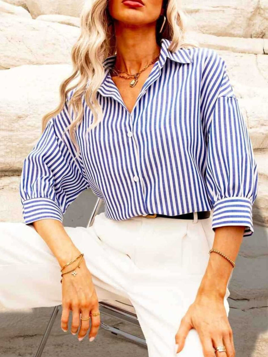 100% polyester Care instructions: Machine wash cold button-down shirt in Blue with relaxed silhouette