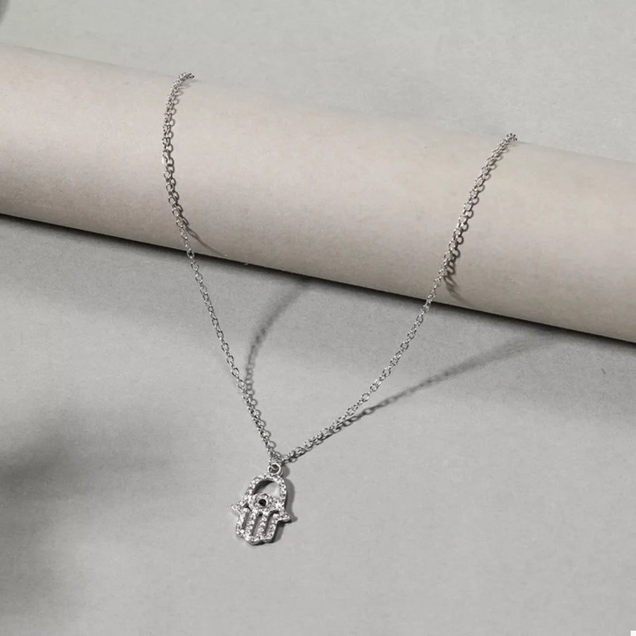 Silver evil eye hamsa pendant necklace with rhinestones