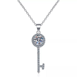 925 sterling silver,Moissanite Carat weight: 1ct Care instructions: Avoid wearin necklace in Silver with key shape silhouette