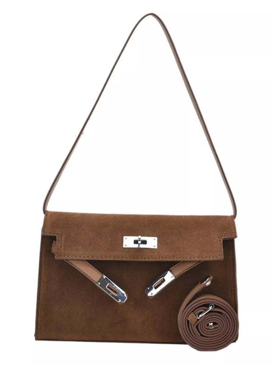 Brown suede shoulder bag with silver hardware and a top handle.