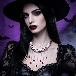 necklace in red with eyeball motif and eyeball motifs