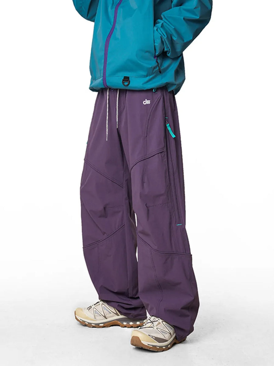 Relaxed Meadow Purple cargo active pants with drawstring and zip pocket detail.