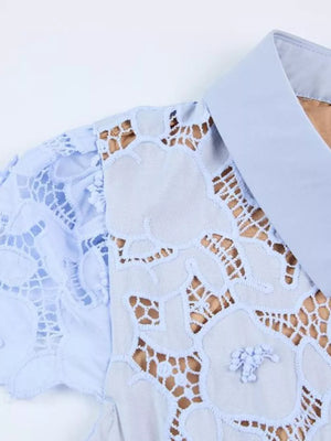 Sky blue lace midi dress with floral detail and collar.