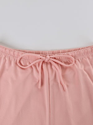 Pink lounge set shorts with elastic waist and decorative bow detail