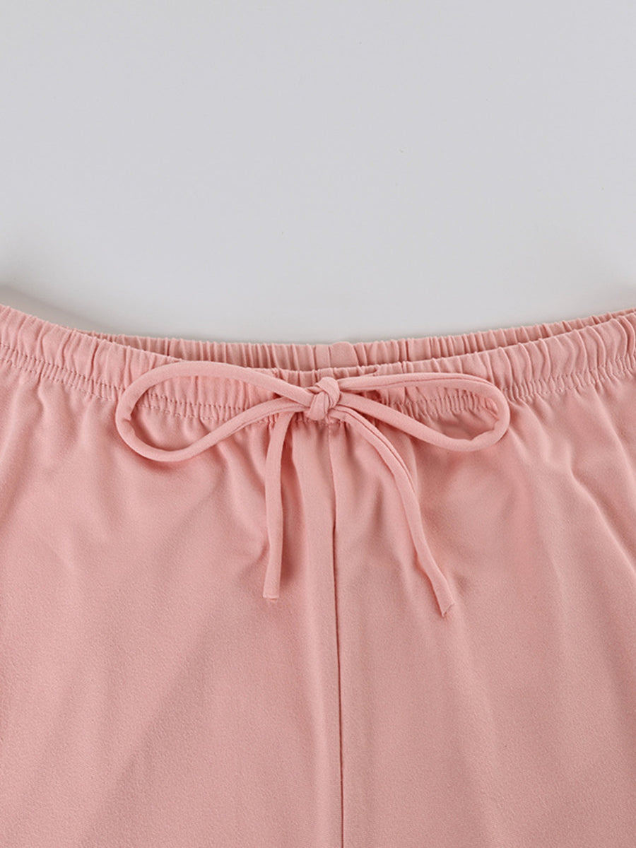 Pink lounge set shorts with elastic waist and decorative bow detail
